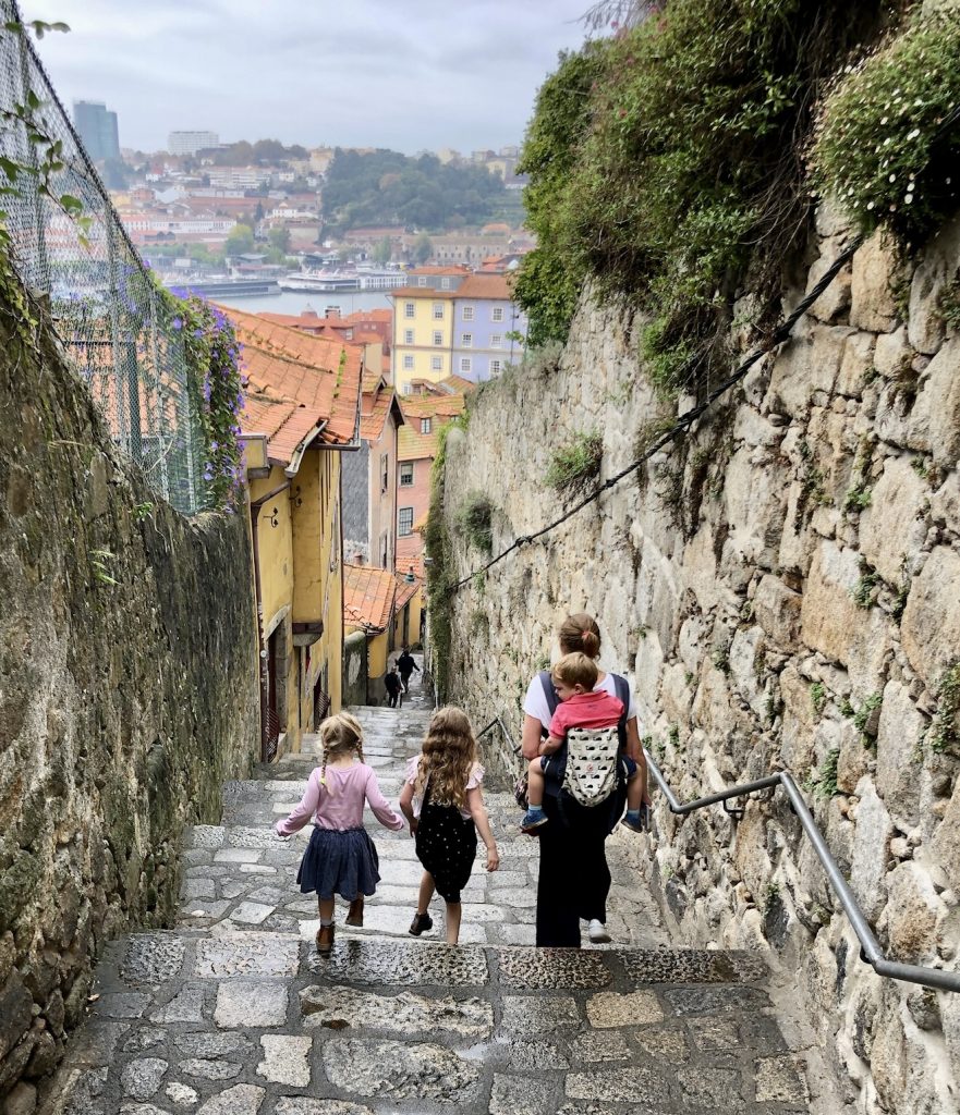 Family wandering backstreets of La Ribeira