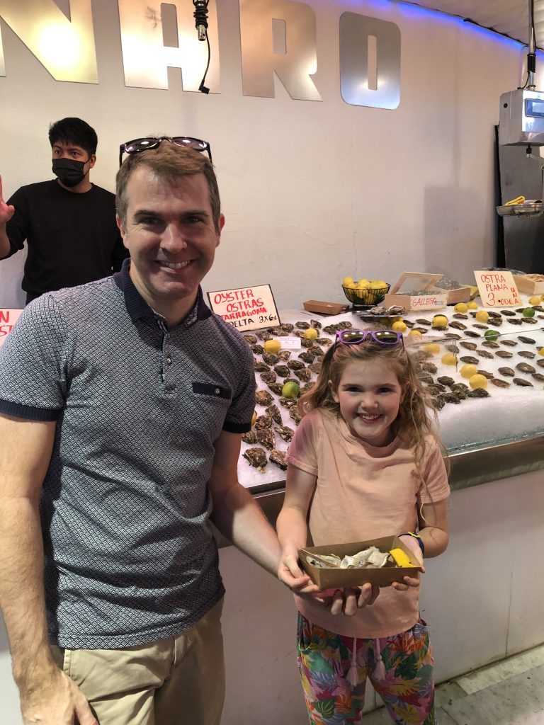 Buying oysters at Mercat la Boqueria, Barcelona