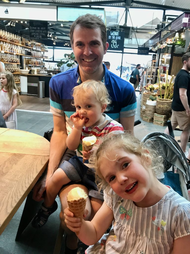 Adam and Benjamin eating ice cream in the Torvehallerne food hall in Nørreport, Copenhagen.