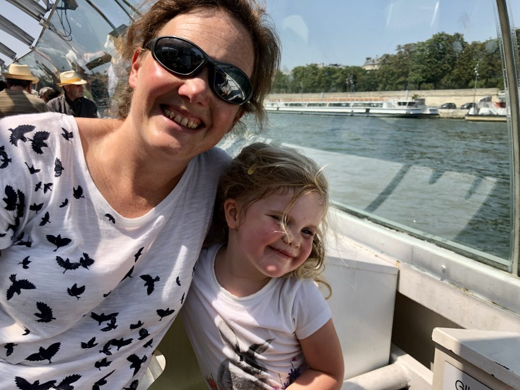 Jude and Martha on the Batobus, cruising along the Seine river in Paris.
