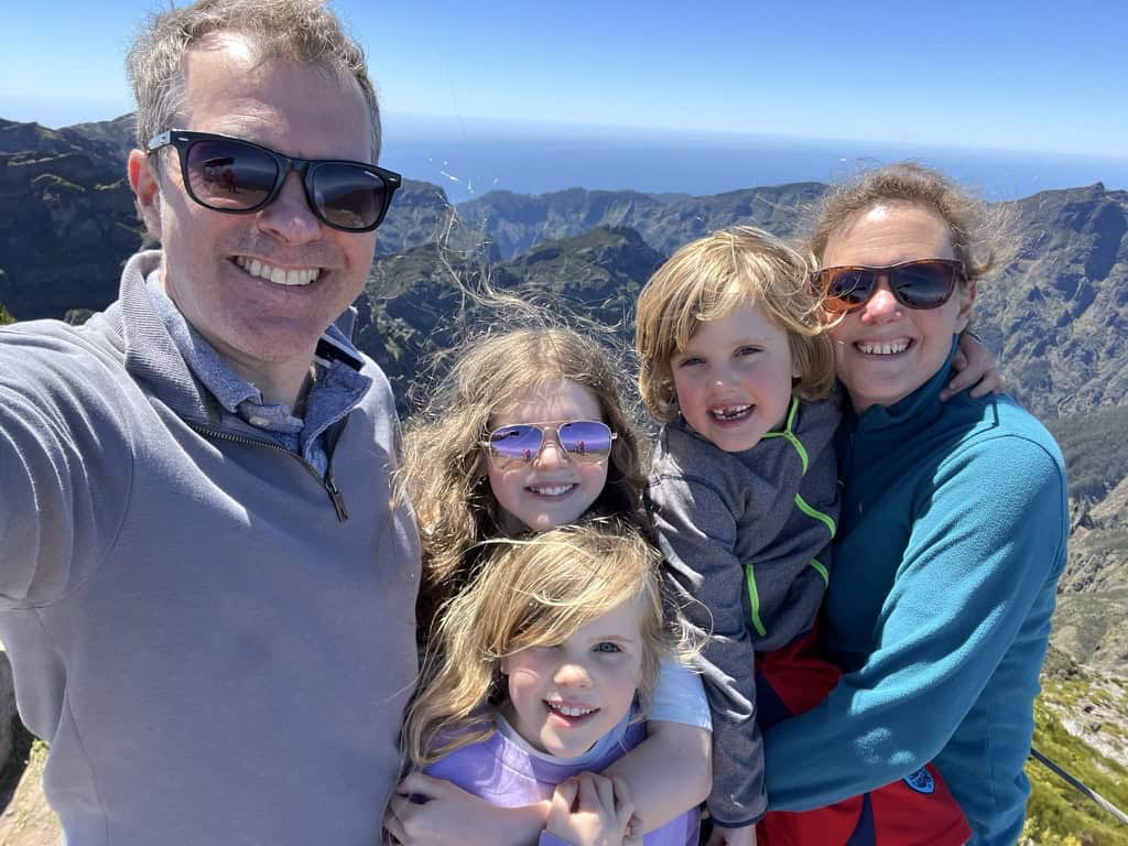 Family selfie taken at the top of Pico Ruvio, the tallest mountain in Madeira.