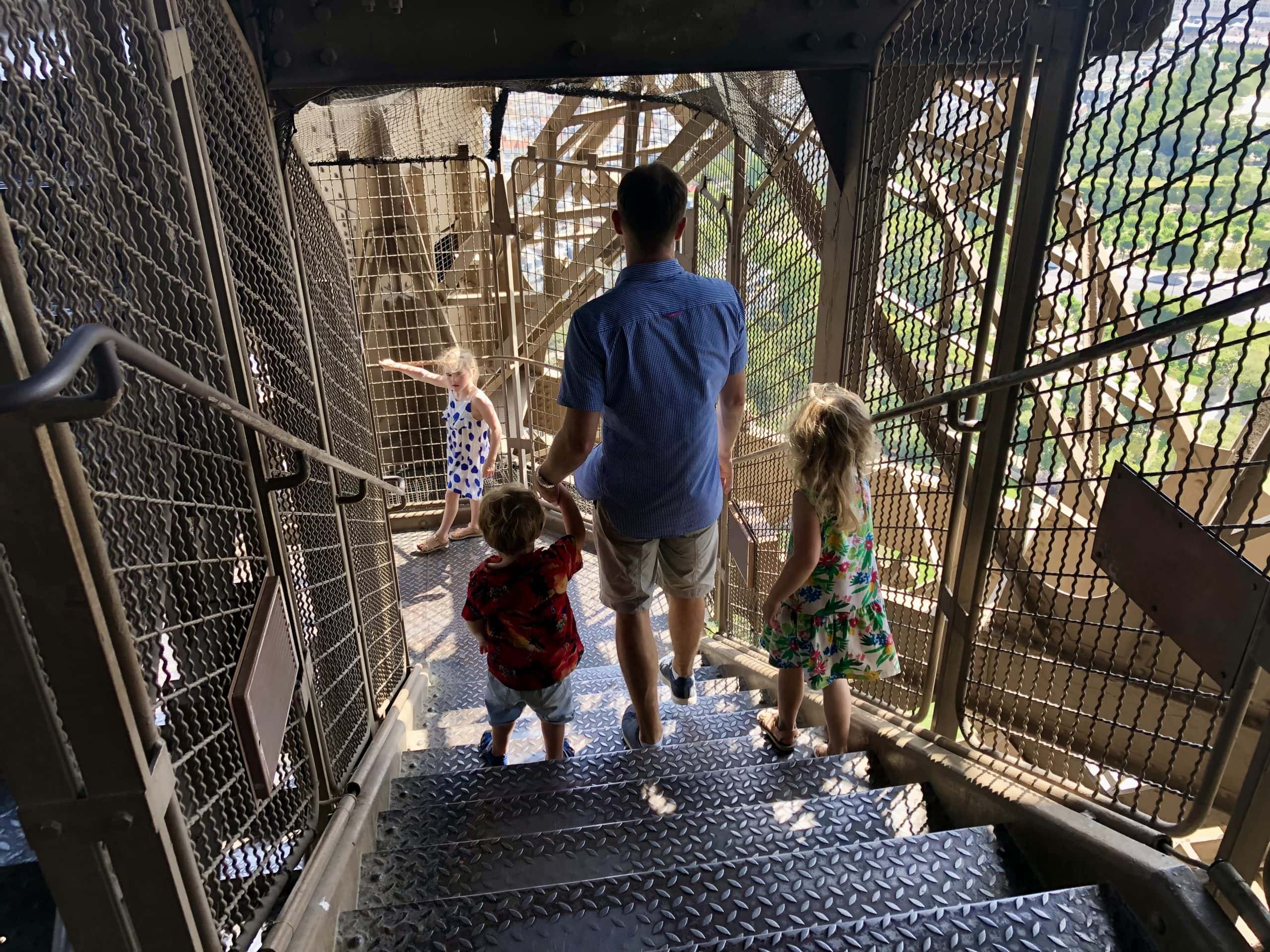 Walking down steps of Eiffel Tower