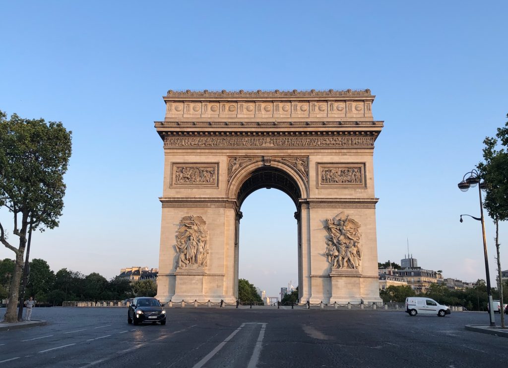 Arc de Triomphe in Paris, in the early morning sunlight.