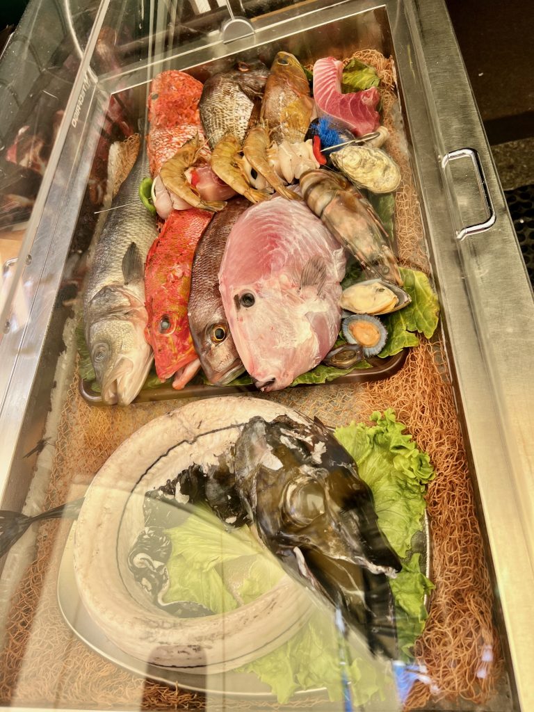 Fish and seafood displayed at a restaurant in Madeira.
