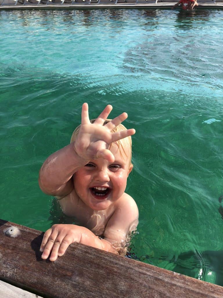 Benjamin enjoying the rooftop pool at the Hilton Garden Inn, Lecce. A great choice when choosing where to stay in Puglia.
