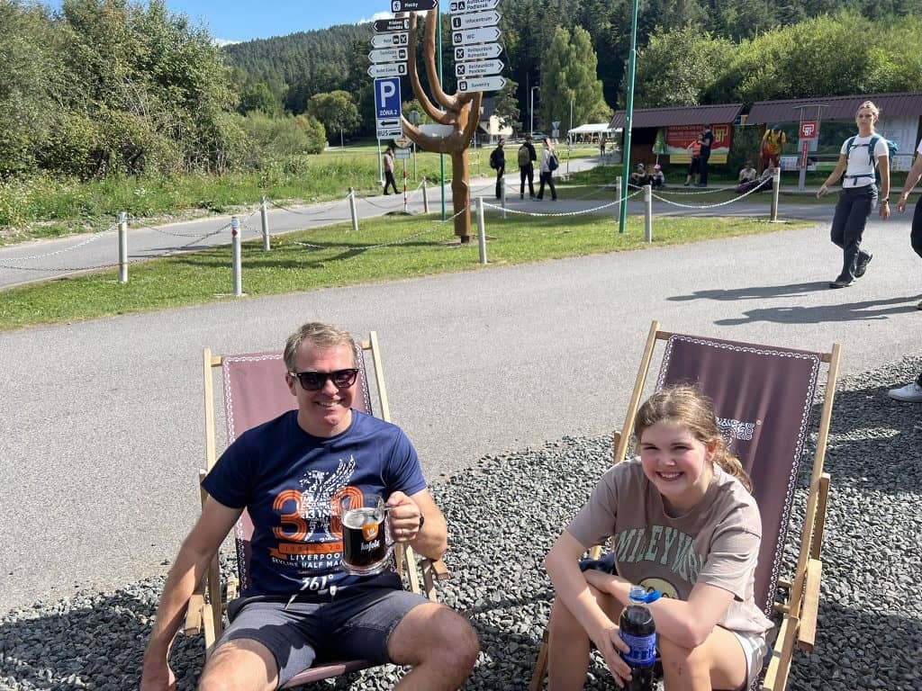 Adam and Chloe enjoying a refreshing drink in one of the cafes in Podlesok after hiking the Sucha Bela gorge.