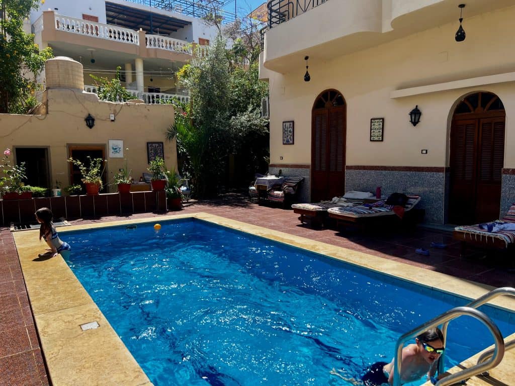 Children playing in the swimming pool at Villa Belzoni in Luxor.