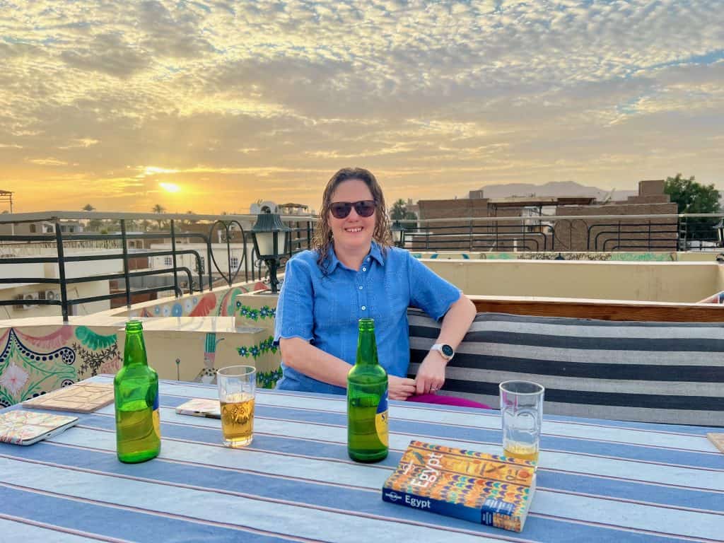 Jude enjoying sunset beers on the roof terrace of Villa Belzoni in Luxor.