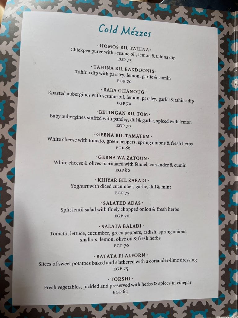 A photograph of the menu showing the cold Mezze available at Sofra restaurant in Luxor.