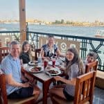 Family meal at a restaurant in West Bank of Luxor overlooking the Nile.