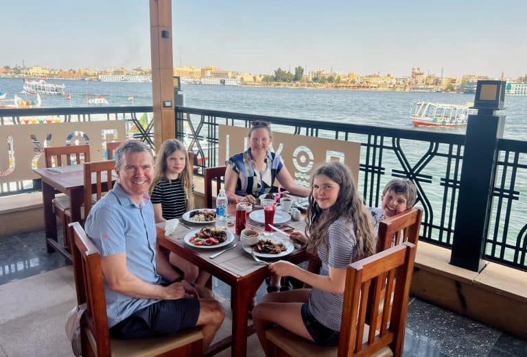 Family meal at a restaurant in West Bank of Luxor overlooking the Nile.