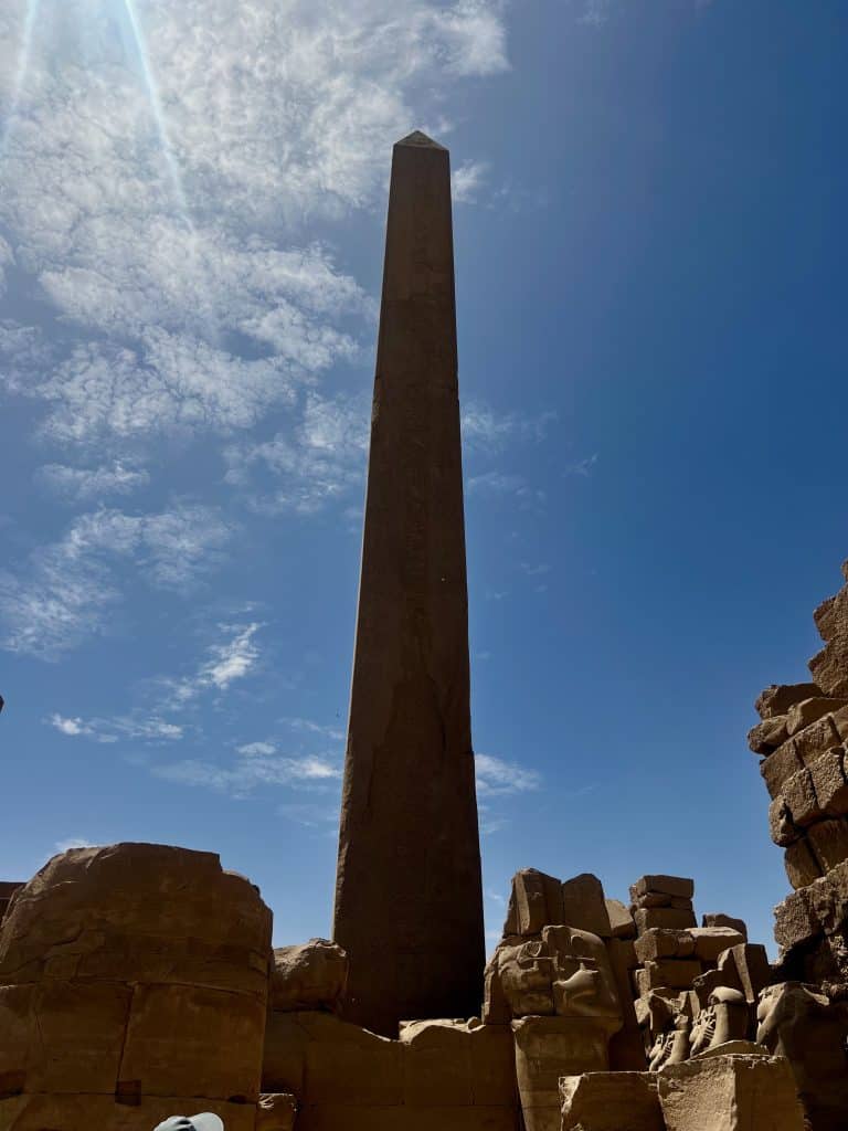 Hatshepsut's obelisk, with other ruined parts of Karnak Temple visible around it. In Luxor, Egypt.